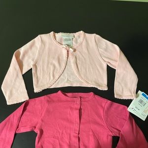 Two short sweaters for dress size 24 months